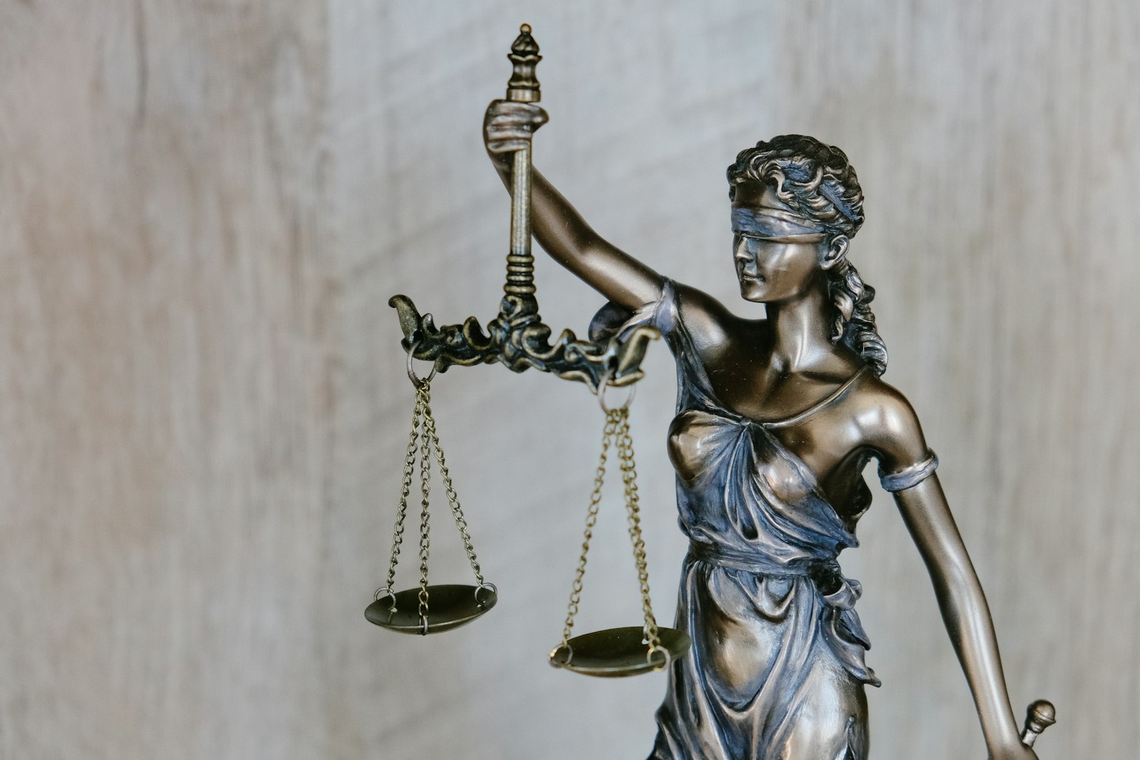 A judge's gavel beside the scales of justice